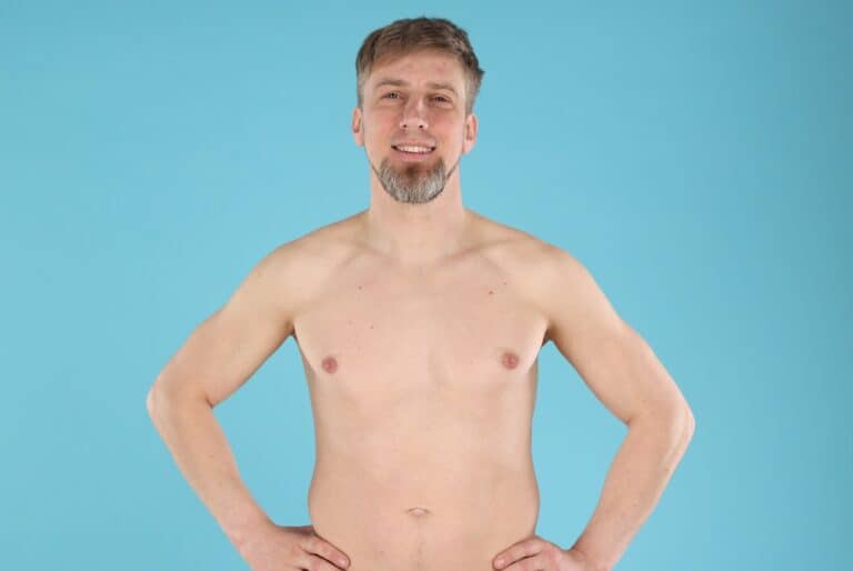 posing man in blue background